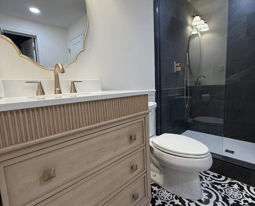 Full bathroom remodel with vanity and walk-in shower