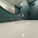 dark green bathroom white sink countertop